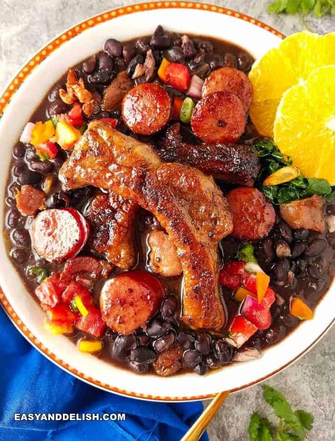  A colorful mix of black beans, sausage, bacon, and beef, making a perfect dish