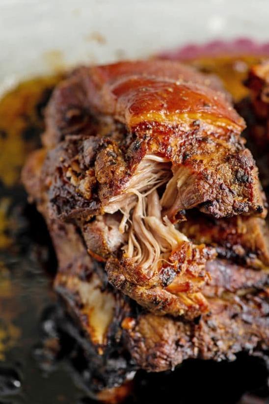  A plate of Pernil with rice and beans is the perfect hearty meal to warm your soul.