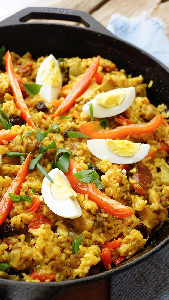  A spoonful of Arroz Valenciana is like a burst of sunshine in your mouth.