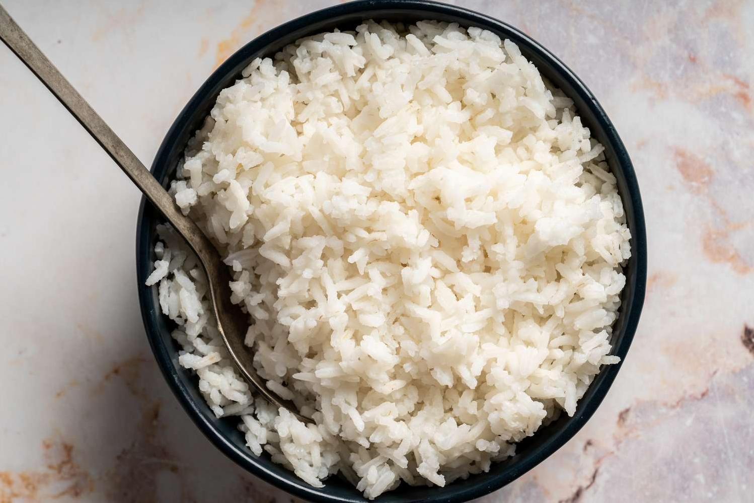  A steamy pot of Arroz Blanco, the perfect side dish for any meal.