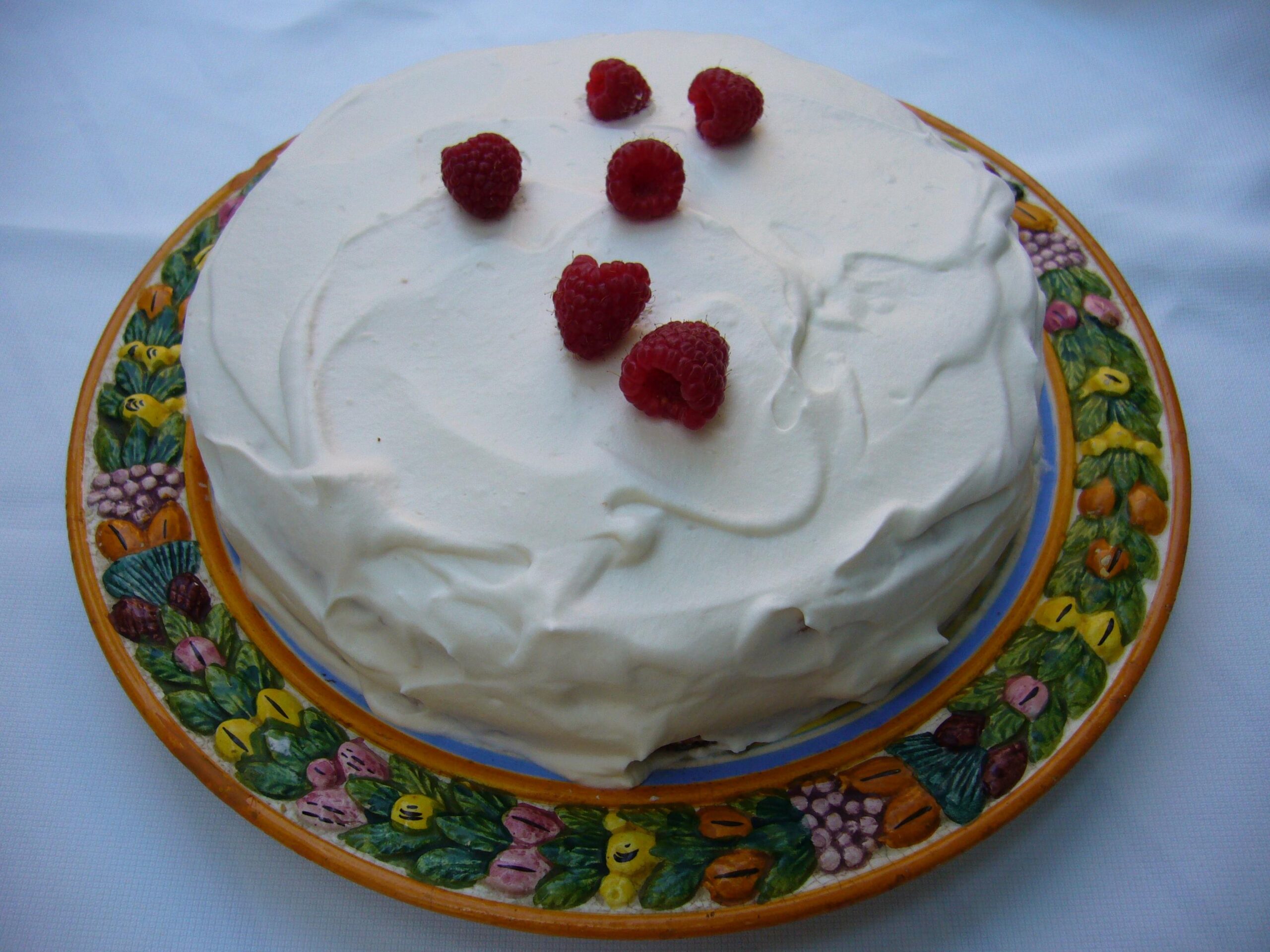  A sweet treat to delight your taste buds - Tres Leches Cake with Raspberries!