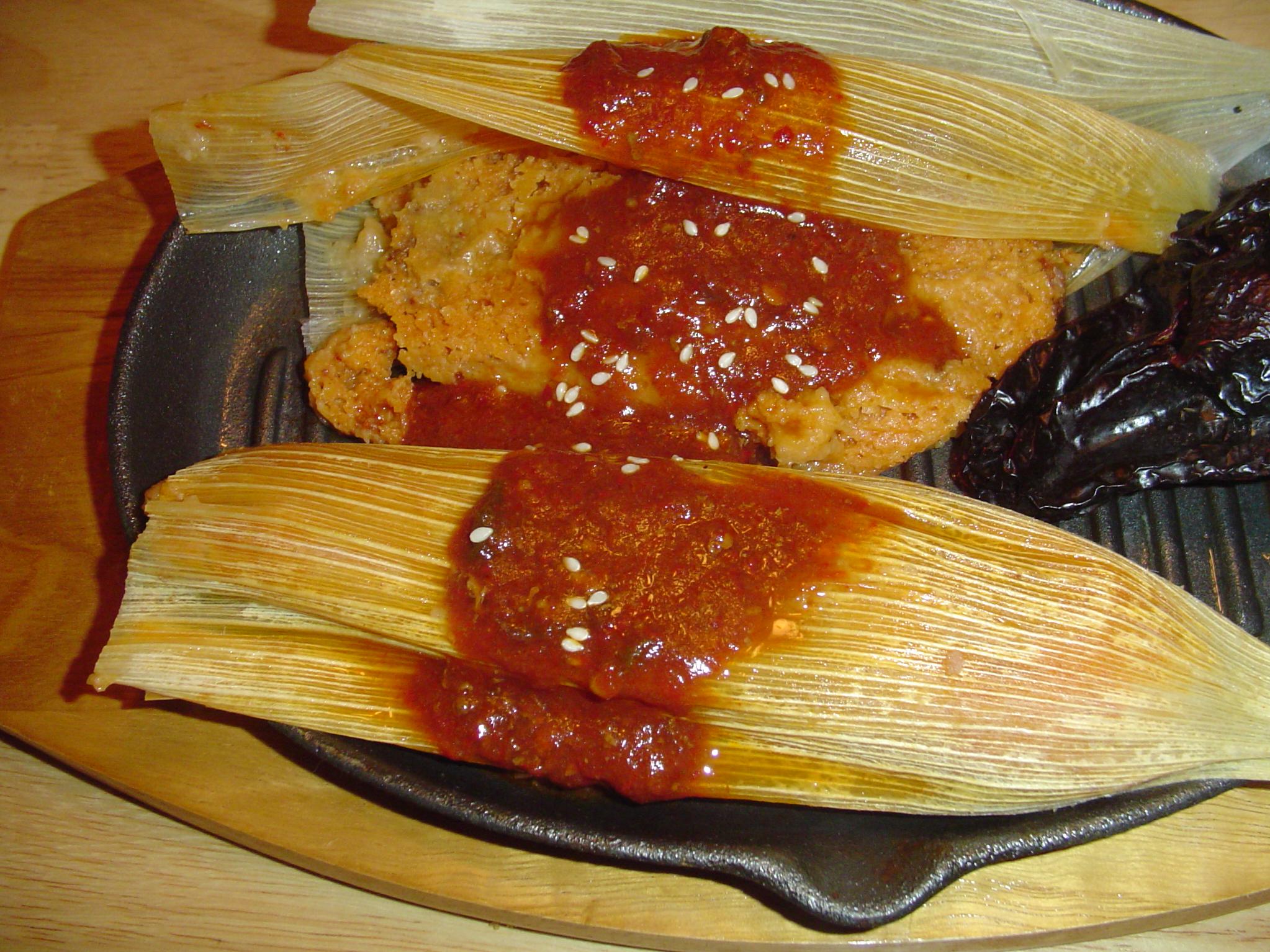  A tantalizing aroma wafts through the kitchen as tamales cook