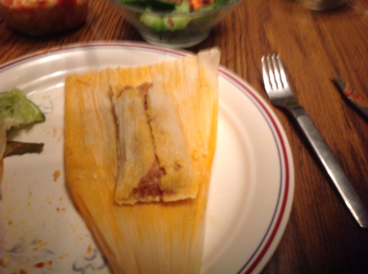  Adding just the right amount of filling to make the ideal tamale