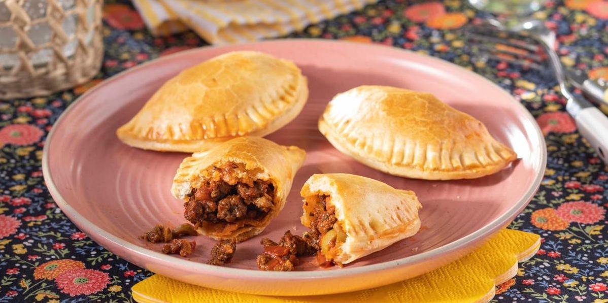  Baking the empanadas gives them a crispy exterior without the
