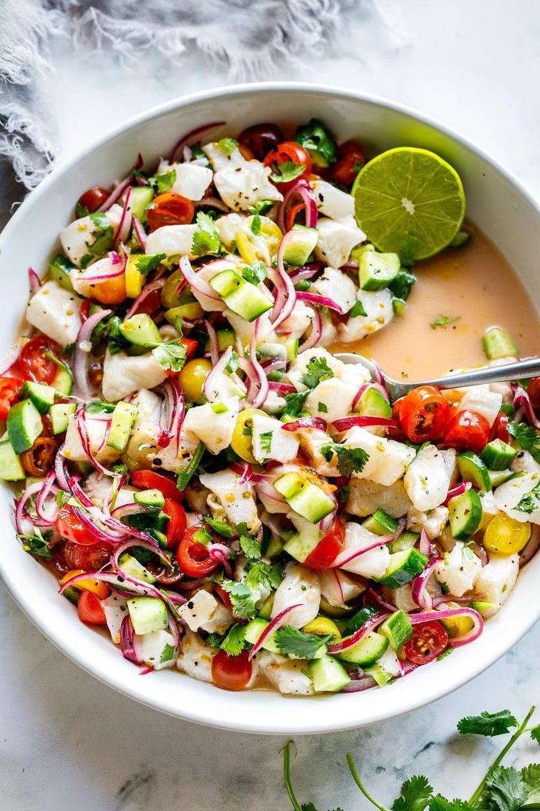  Bite into freshness with every spoonful of this vibrant ceviche salad.