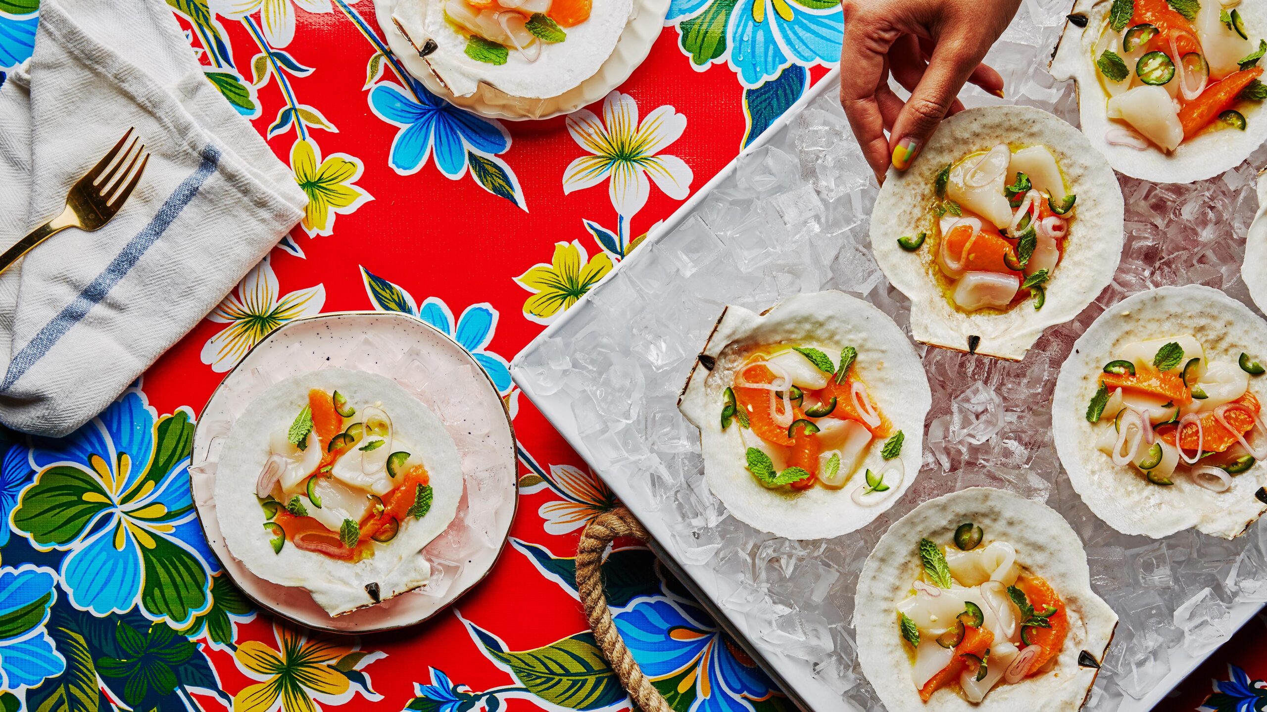 Bite-sized morsels of tender scallops dance in a marinade of vibrant citrus flavors
