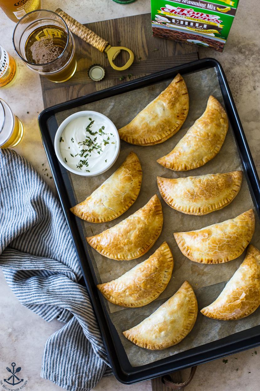  Dive into these delicious empanadas with a flavorful chili-cheese sauce
