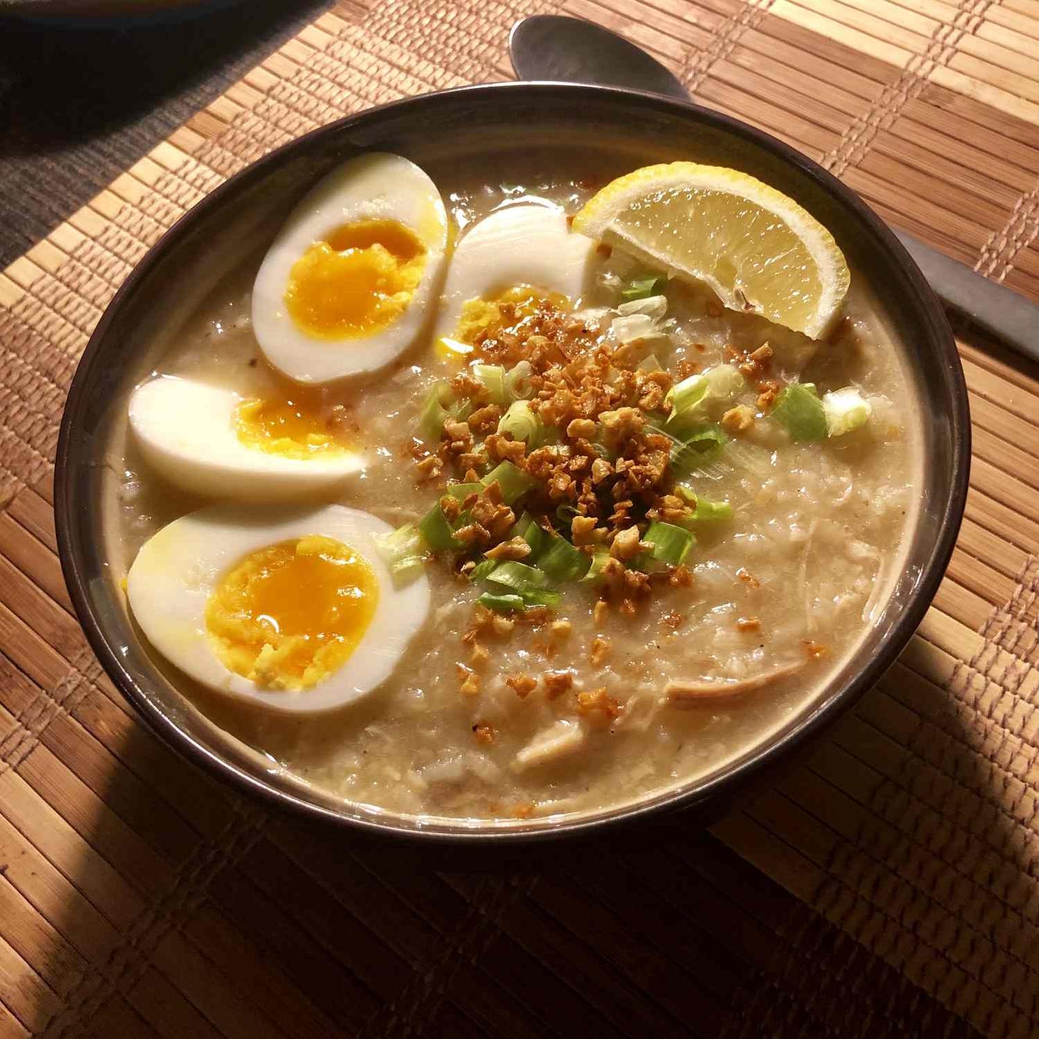  Don't be afraid to take a big scoop of this fragrant and flavorful Arroz Caldo.