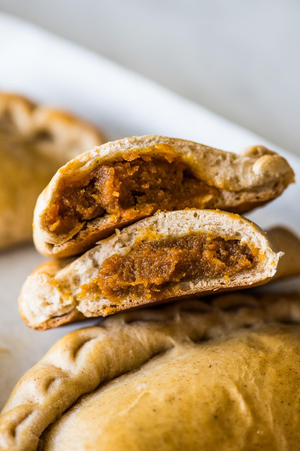  Every bite of these empanadas delivers a burst of warm pumpkin goodness.