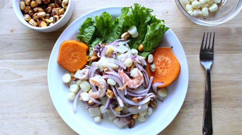  Fresh and colorful ingredients give this Ceviche Mixto its vibrant appearance!