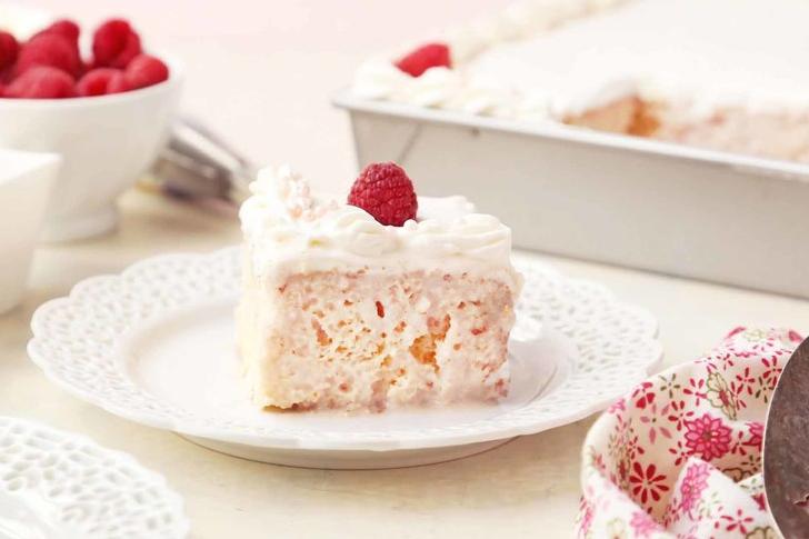  Fresh raspberries add a burst of tanginess to our classic Tres Leches Cake.