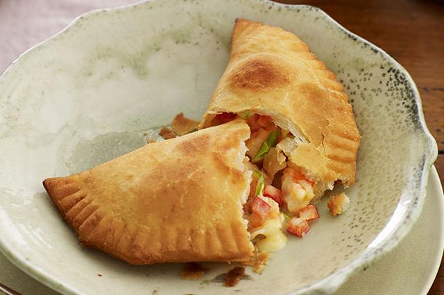  Golden-brown and flaky, these empanadas are a true treat for the senses.