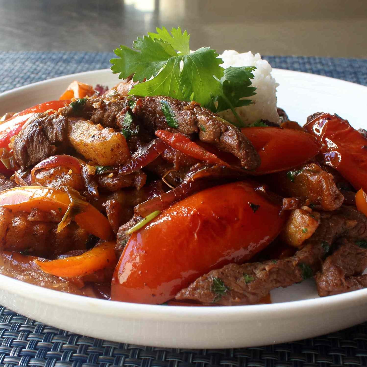  Have your taste buds travel to Peru with this delectable Lomo Saltado recipe.