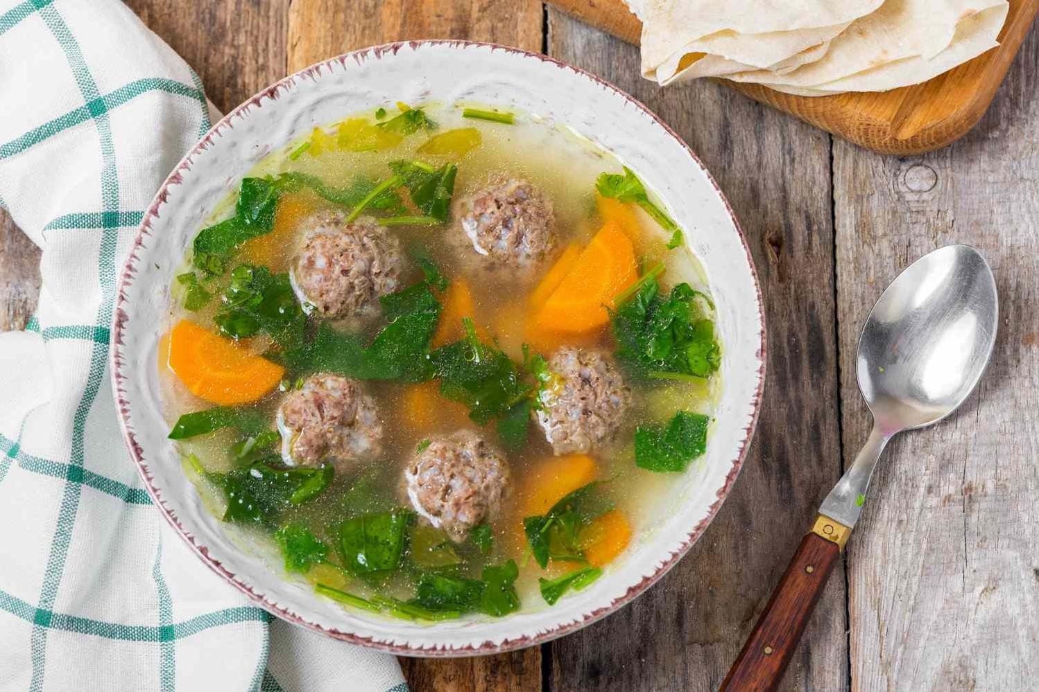  Homemade meatballs swimming in a flavorful broth.