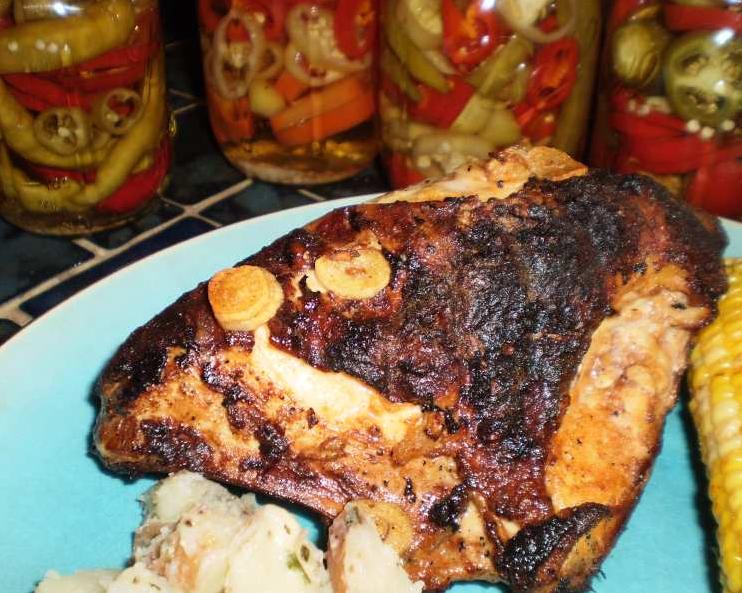  Marinating the chicken in beer tenderizes the meat and infuses it with subtle but complex flavors.