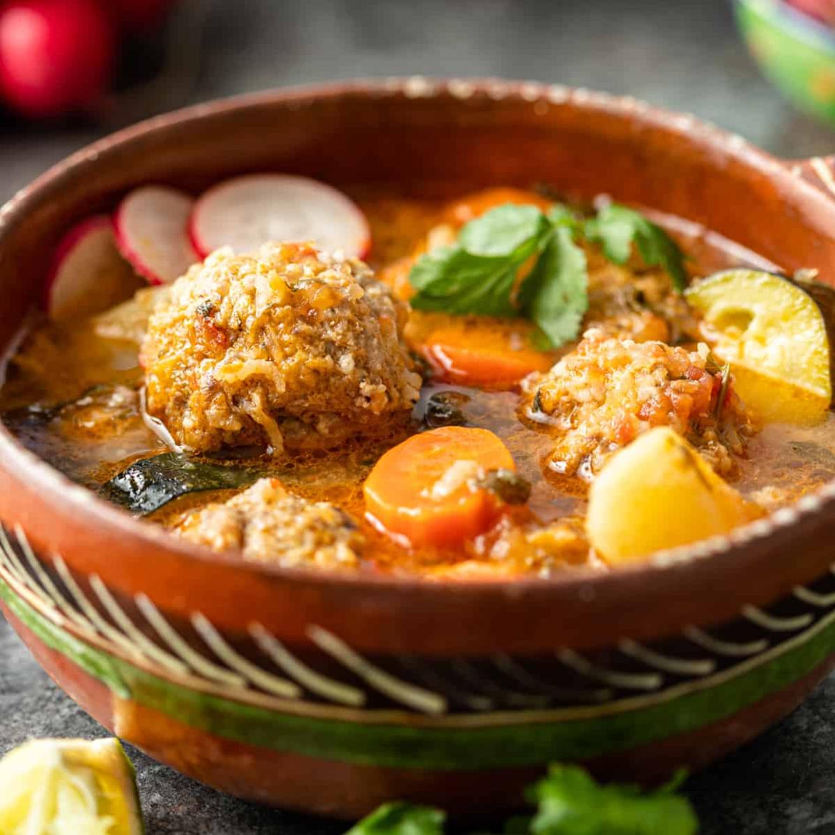   Meatballs cooked to perfection in a flavorful broth!