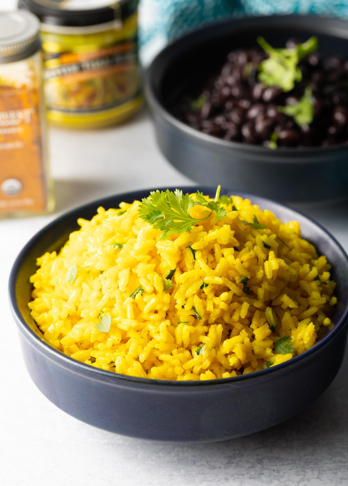  Perfectly cooked yellow rice kissed with saffron, topped with earthy peas - heaven on a plate