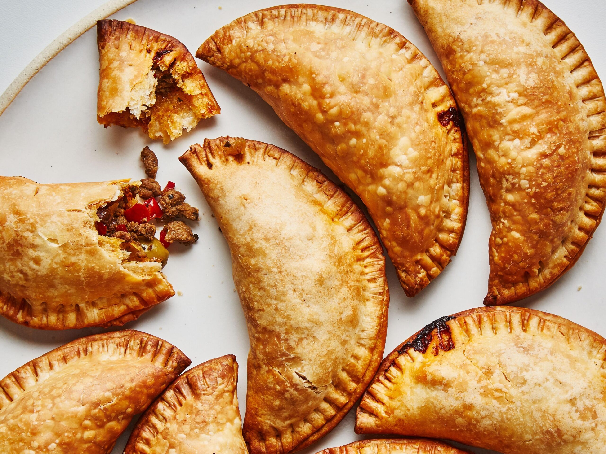  Perfectly crispy on the outside, warm and flavorful on the inside - this is the ultimate empanada experience.