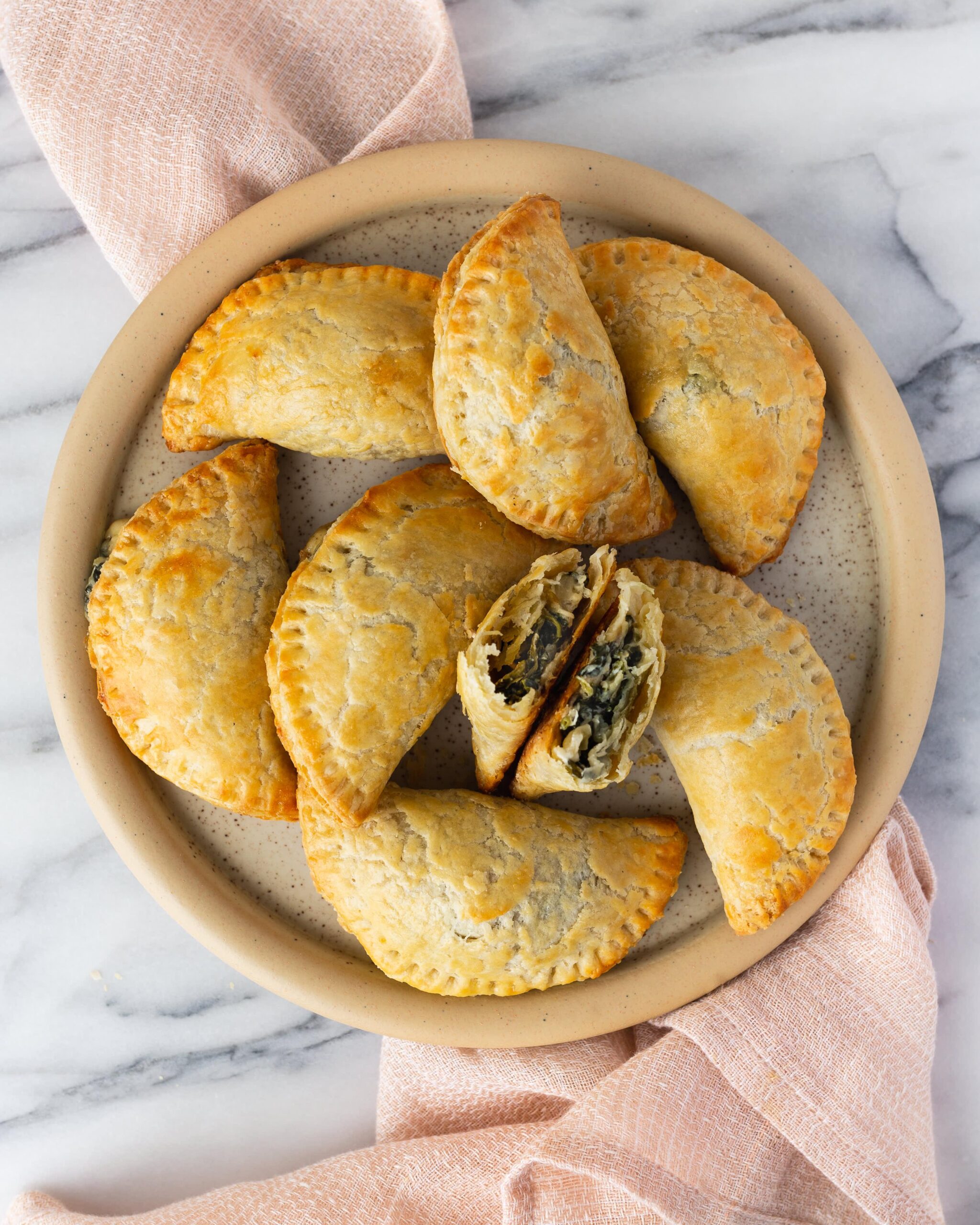  Perfectly stuffed and crisped Indian empanadas with spinach and potato filling.