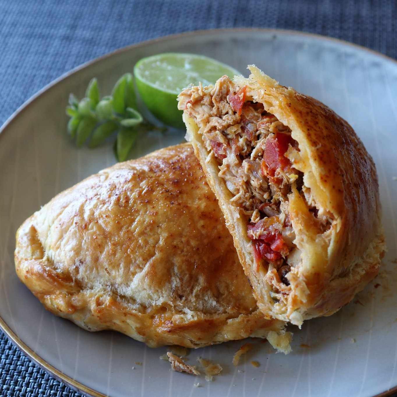  Sink your teeth into the crispy, golden-brown crust of these delicious chicken empanadas.