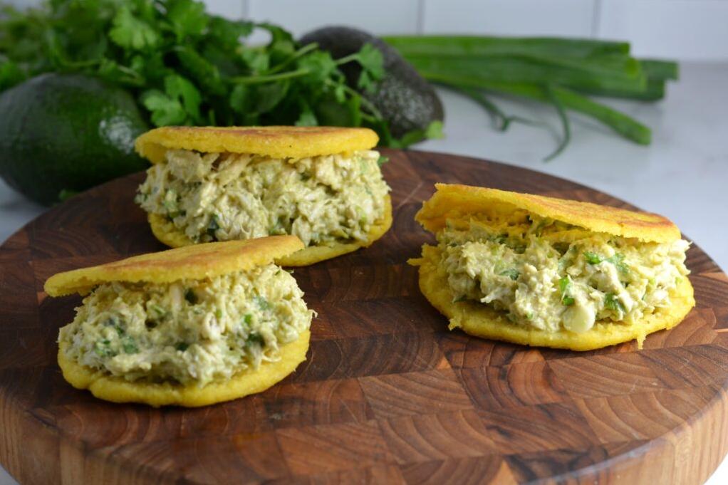  Spice things up: For those who like it hot, add some chili sauce to give these arepas a kick.