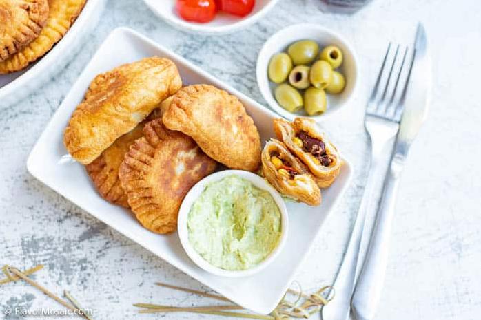  The golden flaky crust of these empanadas will have you begging for more.