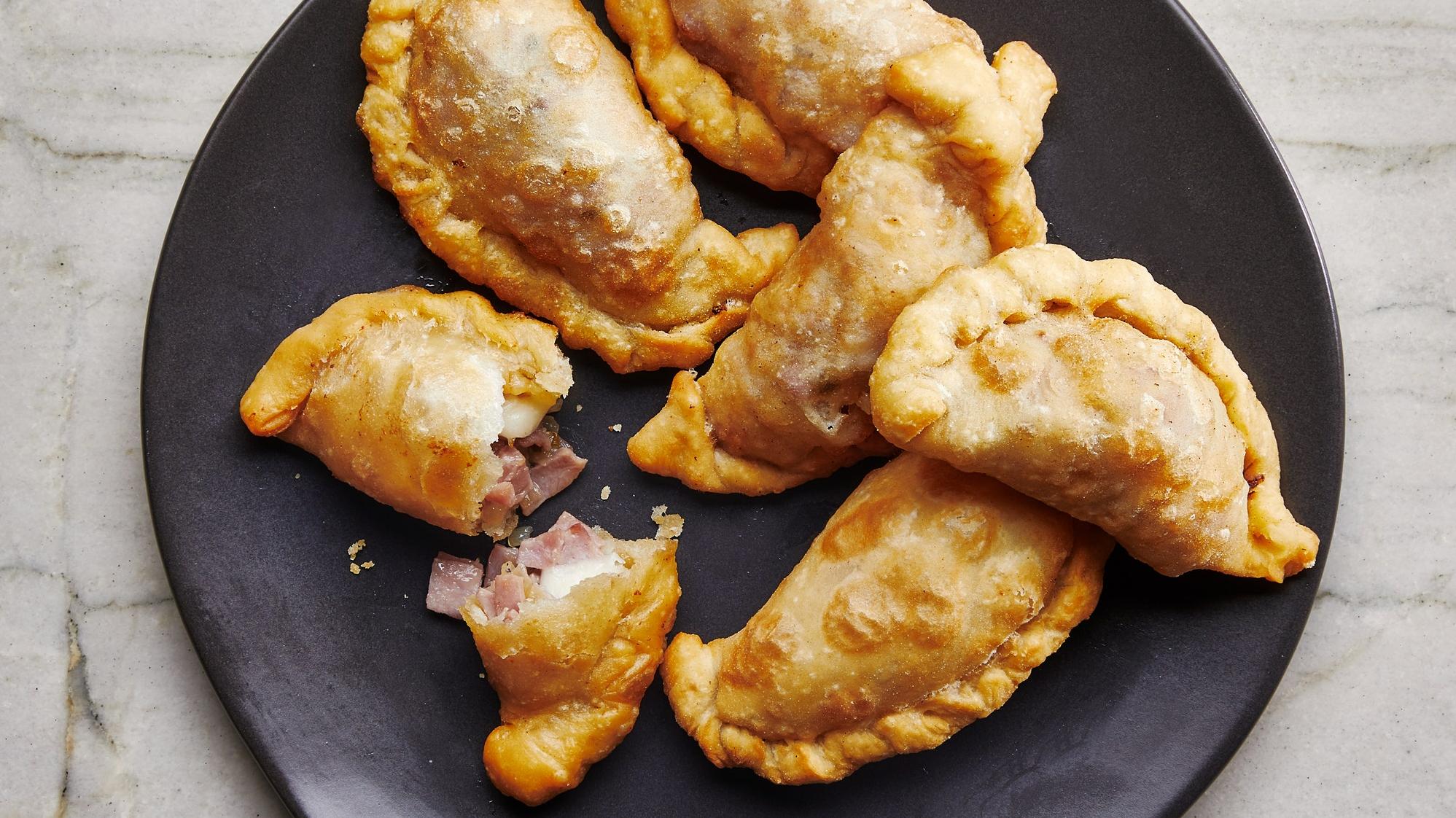  These crispy pastry pockets are filled with salty ham and gooey cheese - a match made in heaven!
