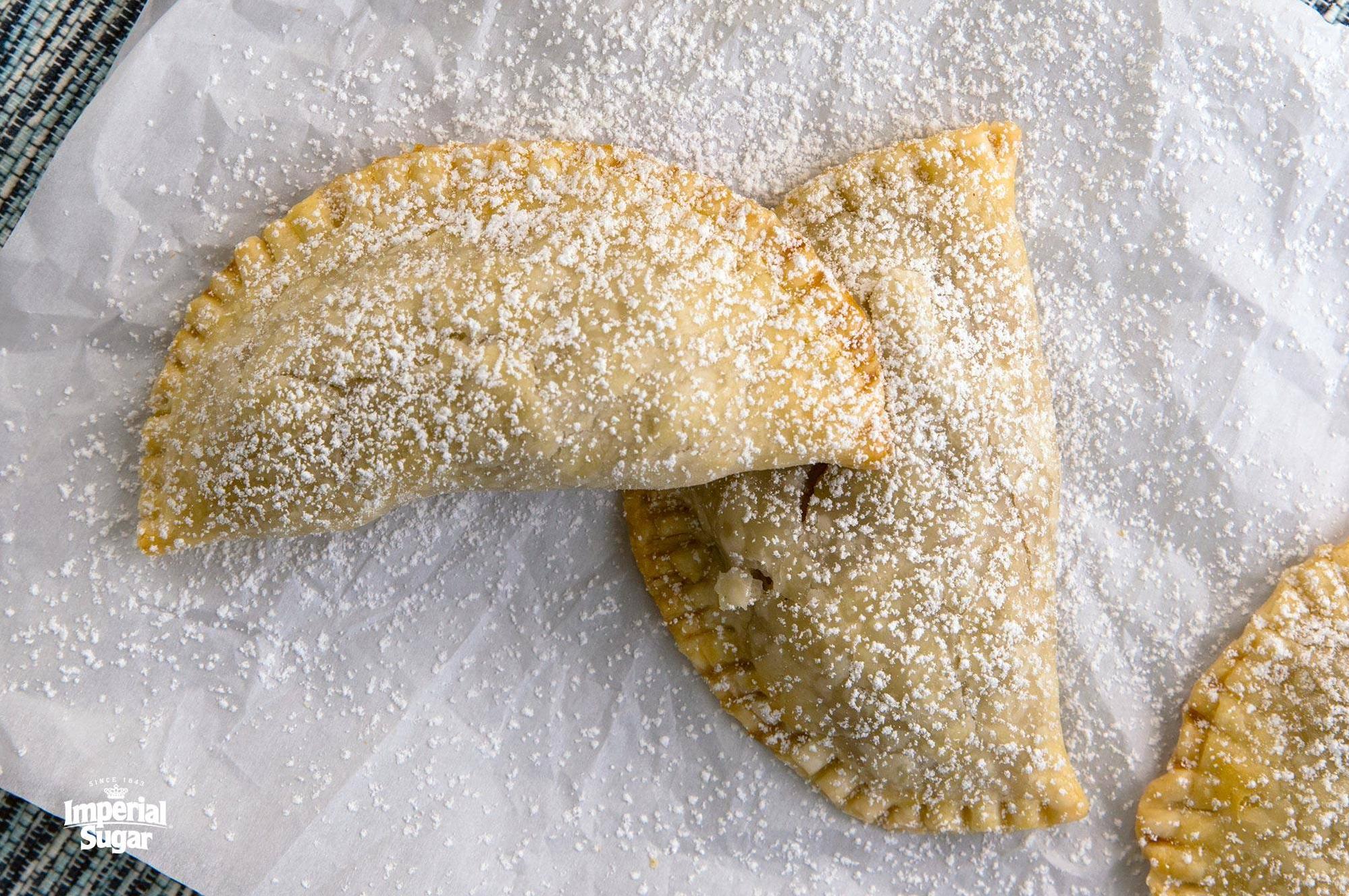  These empanadas are stuffed with sweet and creamy bananas for a delicious treat.